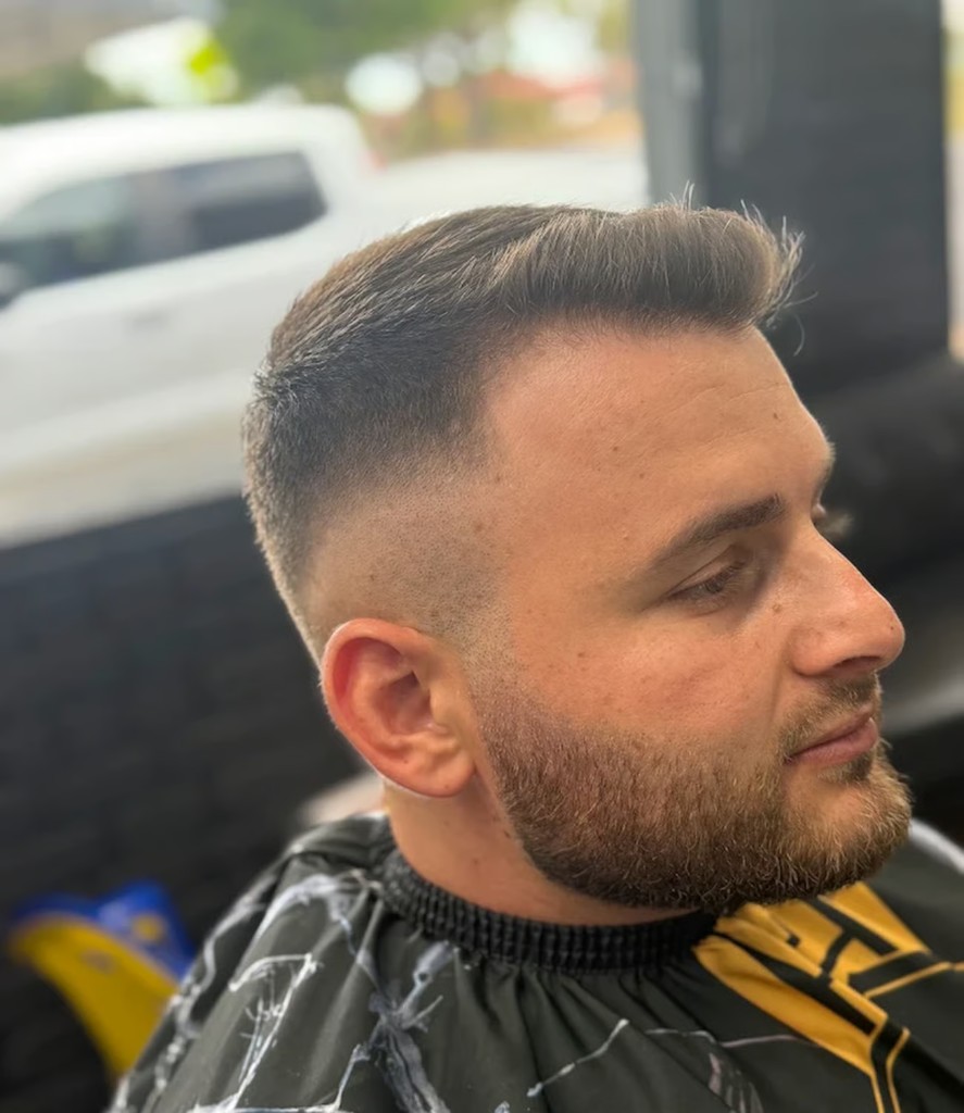 Close-up of a men's skin fade haircut and groomed beard after a visit to Royale Fade Barbershop, Warragamba.